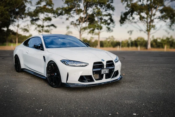 BMW G82 M4 Competition on E85 with WERKE Forward Facing Air Intakes and hybrid turbo S58 performance upgrades.