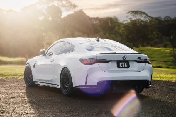 BMW G82 M4 Competition on E85 with WERKE Forward Facing Air Intakes and hybrid turbo S58 performance upgrades.