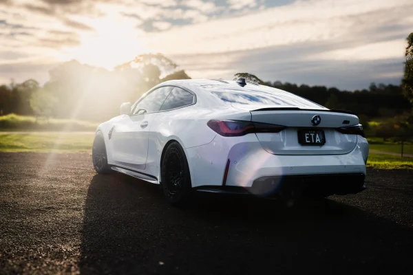 BMW G82 M4 Competition on E85 with WERKE Forward Facing Air Intakes and hybrid turbo S58 performance upgrades.