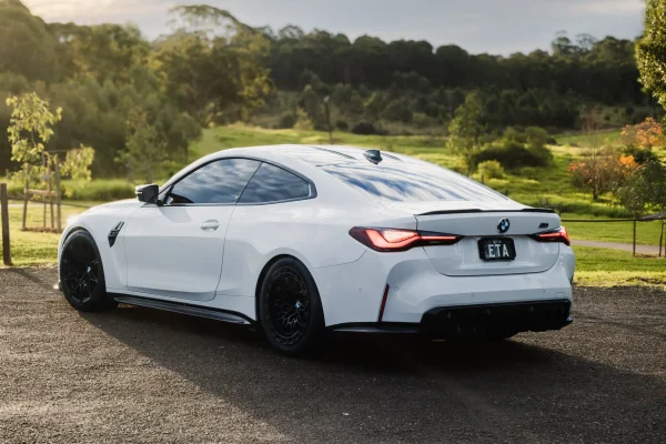 Rear-wheel-drive BMW G82 M4 Competition producing 639RWKW with custom TUNE+ Flex Fuel calibration and WERKE performance parts.