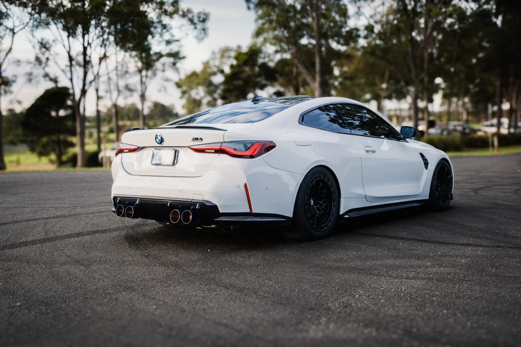 Rear-wheel-drive BMW G82 M4 Competition producing 639RWKW with custom TUNE+ Flex Fuel calibration and WERKE performance parts.