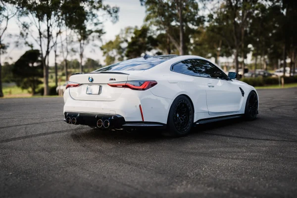 Rear-wheel-drive BMW G82 M4 Competition producing 639RWKW with custom TUNE+ Flex Fuel calibration and WERKE performance parts.