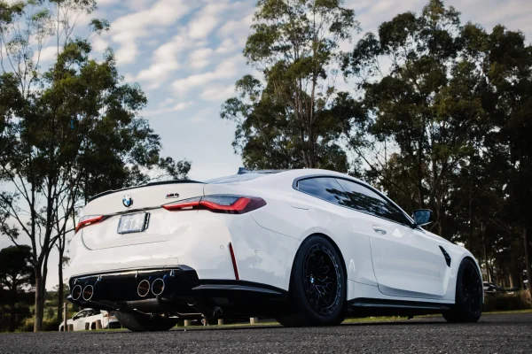 Rear-wheel-drive BMW G82 M4 Competition producing 639RWKW with custom TUNE+ Flex Fuel calibration and WERKE performance parts.