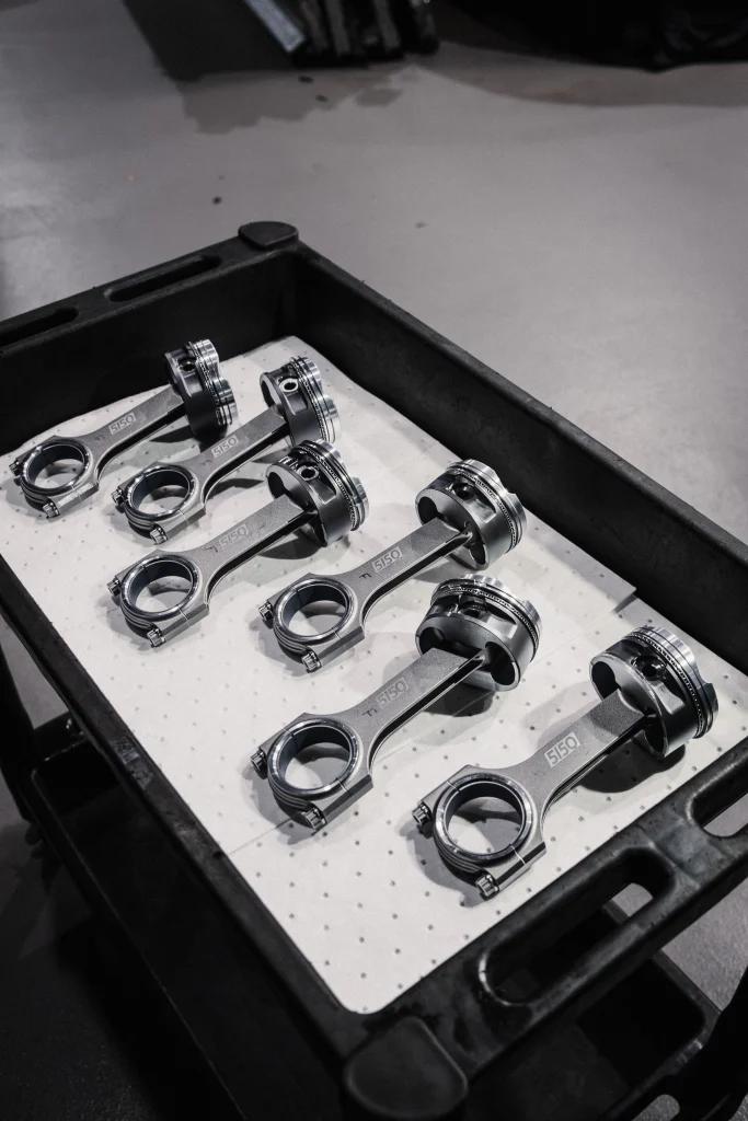 Forged pistons and Carrillo rods assembled for BMW S58 3.4L stroker build