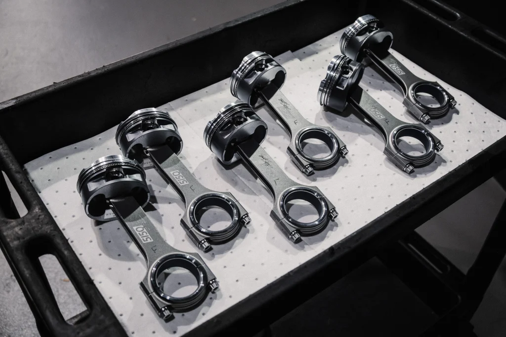 Forged pistons and Carrillo rods assembled for BMW S58 3.4L stroker build