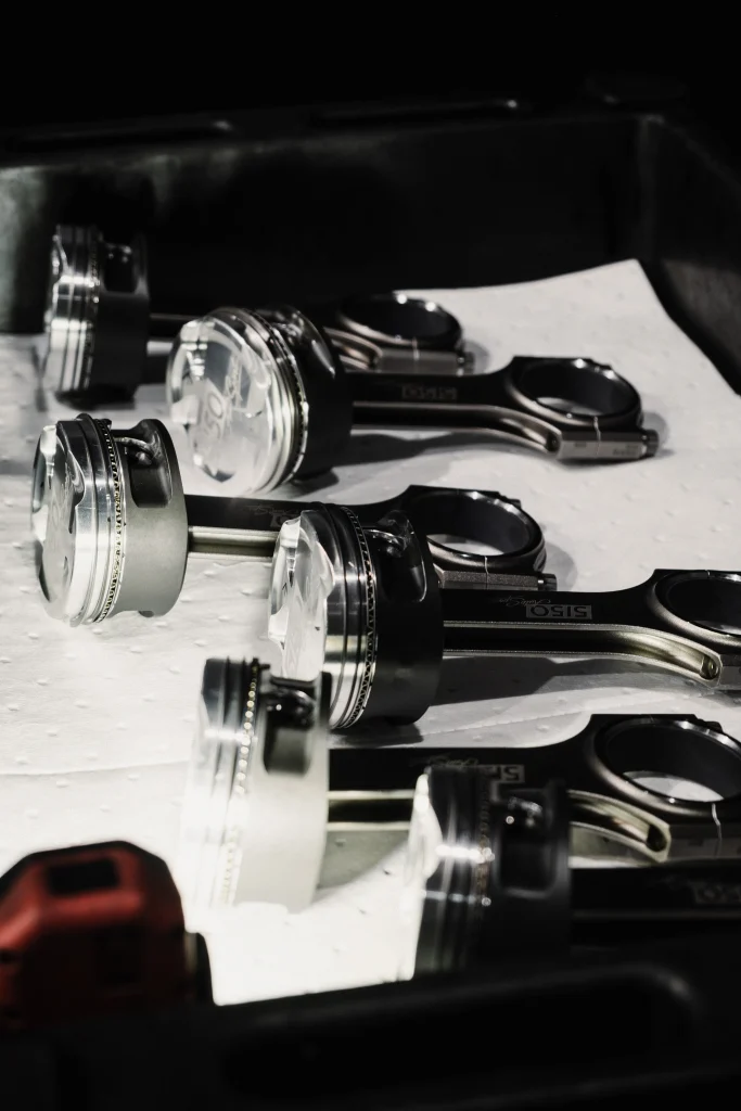 Forged pistons and Carrillo rods assembled for BMW S58 3.4L stroker build
