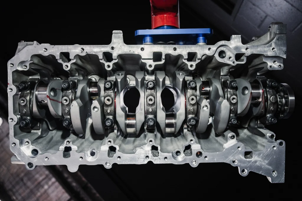 5150 AutoSport stroker crankshaft installed in BMW S58 engine block for Grimace 3.4L build